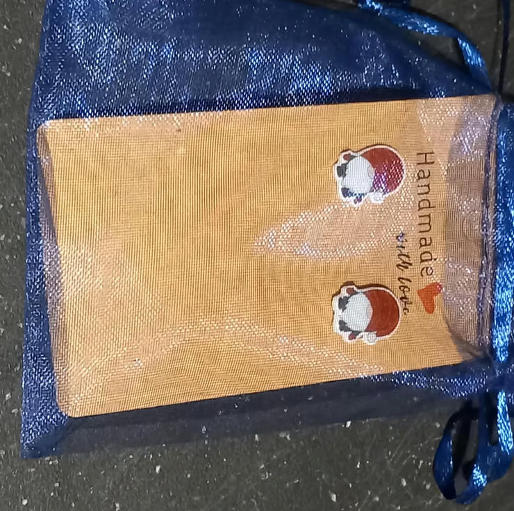 Gonk earrings in a free gift bg