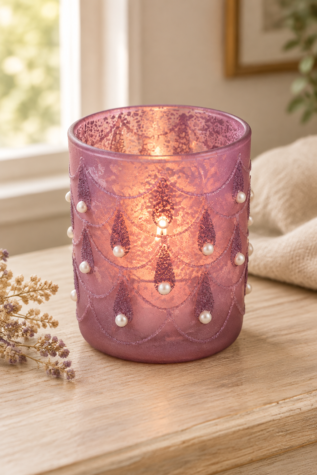 Pink glass hurricane candle holder lifestyle image