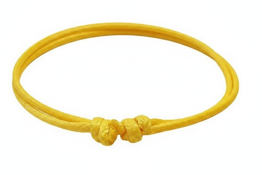 Yellow Waxed Cord Friendship Bracelet on white background, no shadows